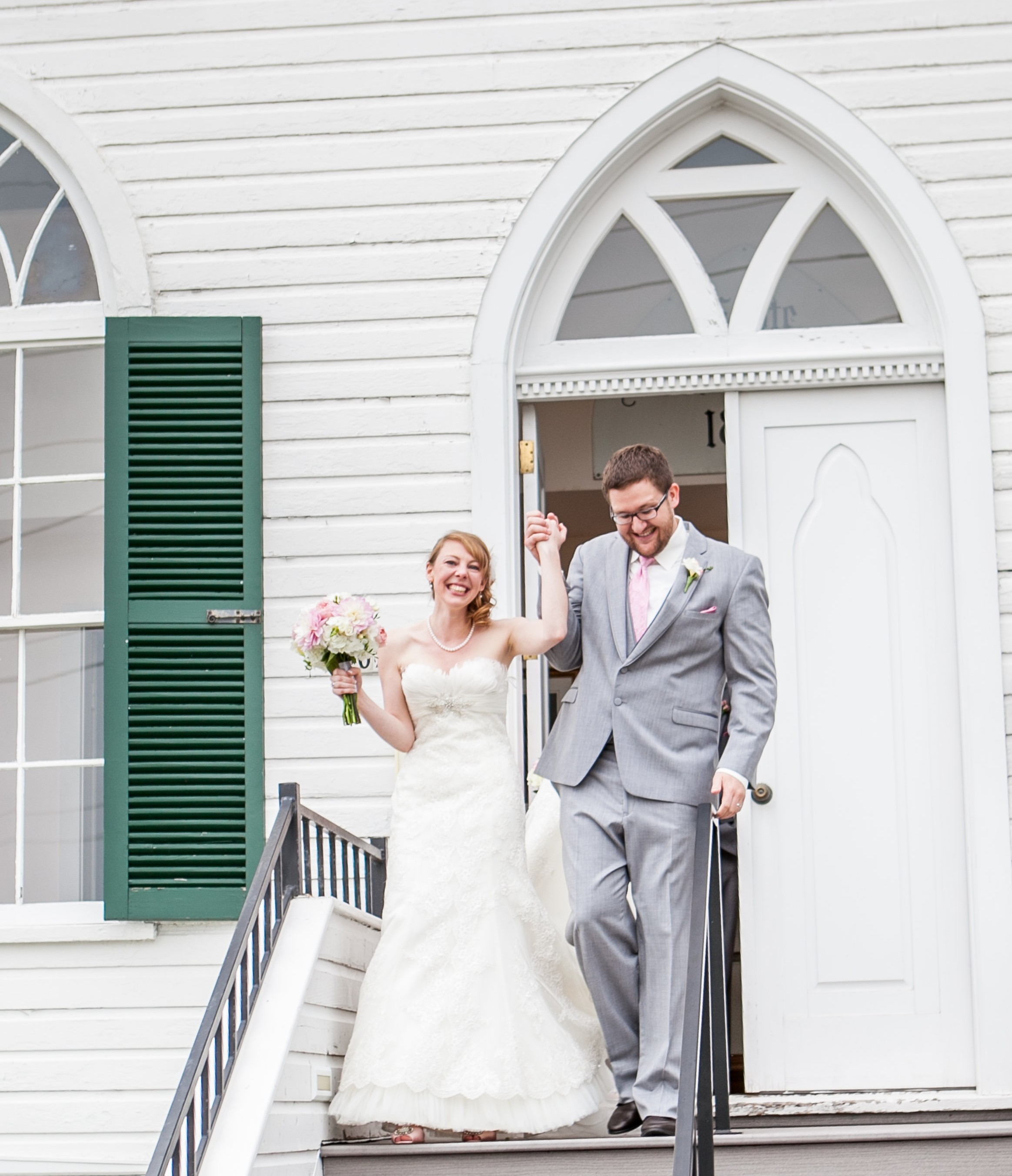 Wedding couple celebrates outside First Lutheran Church